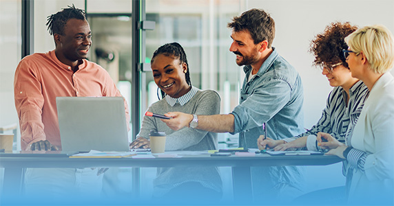 group of diverse employees happily working together